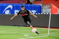 Lorient's midfielder Maxime Barthelme shoots the ball